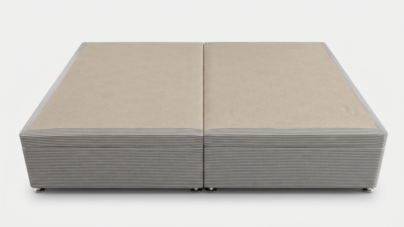 Double ottoman bed base with a ribbed texture on a white background from a side on perspective