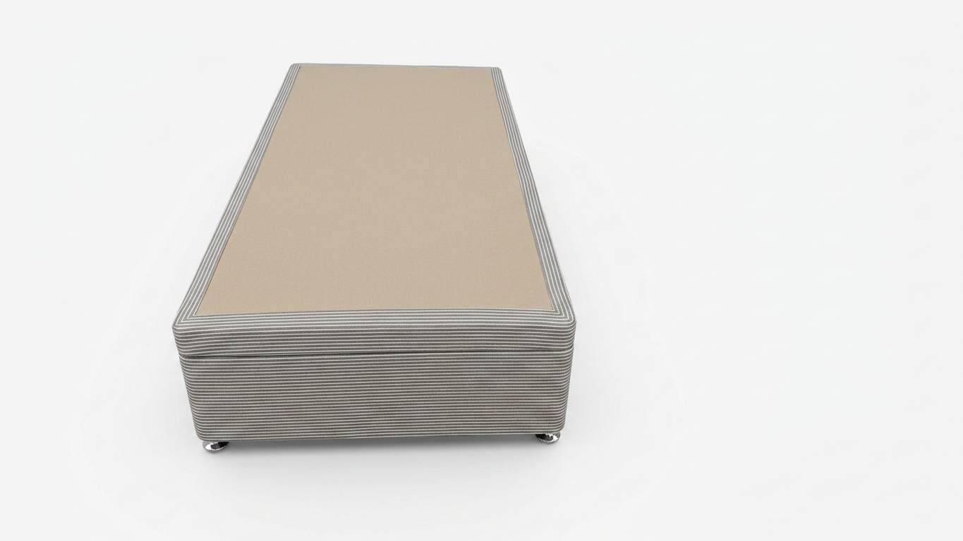 Rectangular single ottoman bed base with a ribbed texture on a white background from the front view