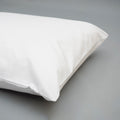 Picture of a cream pillowcase on a pillow