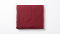 Picture of a wine bedding on a white background. 
