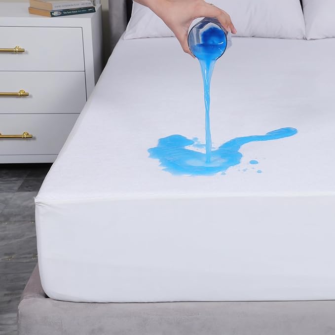 Picture of blue liquid being poured onto a bed mattress