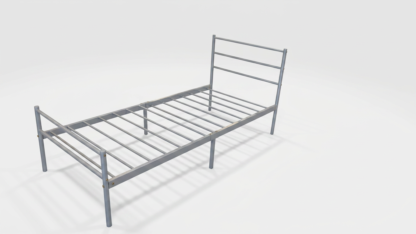 Metal single bed frame on a white background from a side angle
